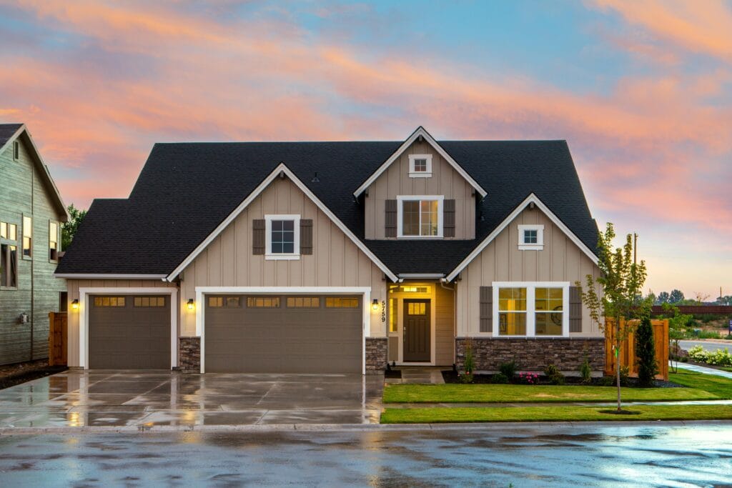pexels-photo-1396122-1396122 Charming family home in Boise, ID with a modern facade and spacious garage.